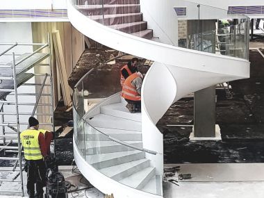 Circular stairway with corian and terazzo cover, Prague